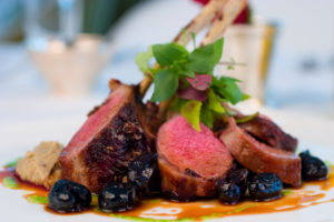 Grilled rack of lamb with black olives